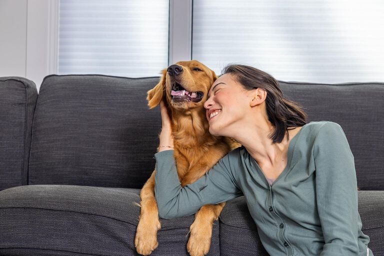 dog and human cuddling