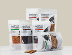 just food for dogs treats presented in bags, including chicken breast treats, chicken apple bark, pumpkin treats, beef liver bark, beef brisket, venison, and salmon bark