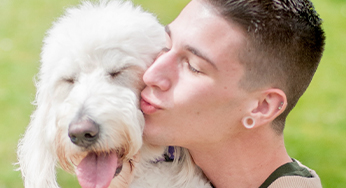 Anthony M., Just Food For Dogs Learning and Development Specialist with his dog Vivian