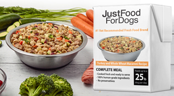 a package of just food for dogs pantry fresh turkey and whole wheat macaroni recipe next to a bowl of the recipe and raw, fresh whole food ingredients displayed around the bowl