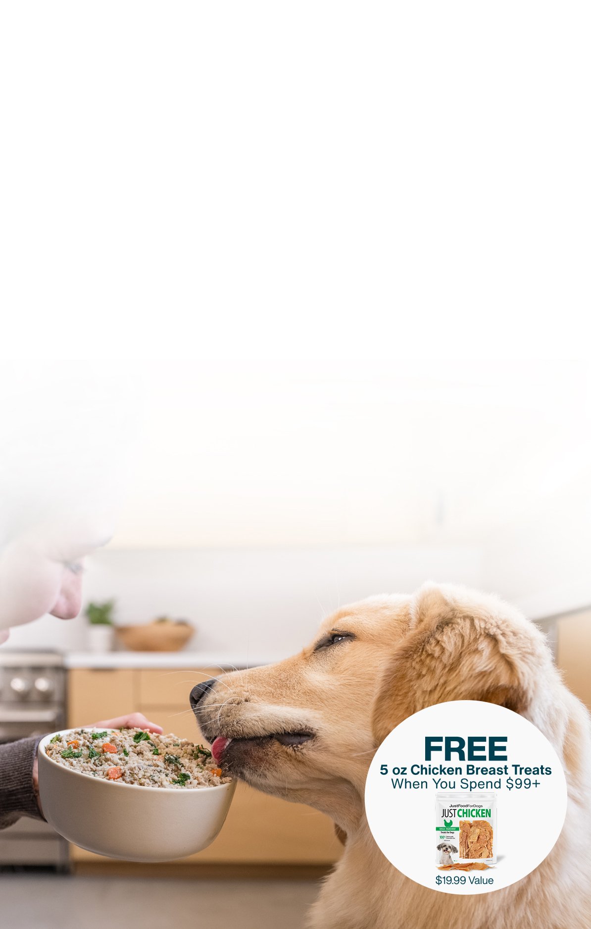 picture of a man holding a dog and bowl of food